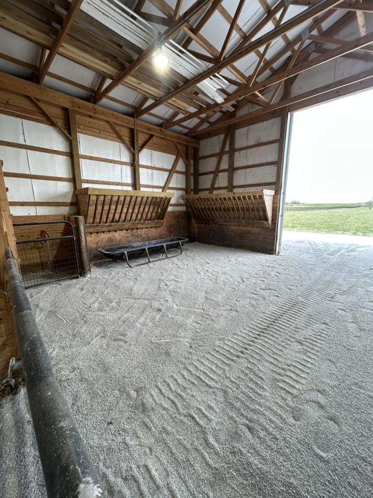 Gravel surface inside a barn
