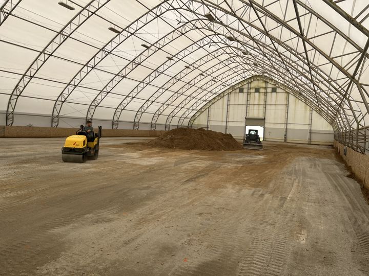 Grading inside a covered arena
